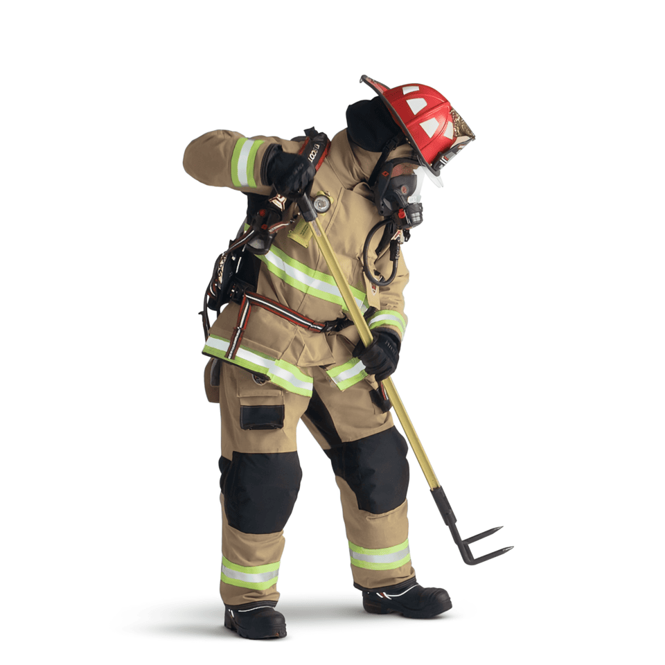 Firefigher wearing gear using tool